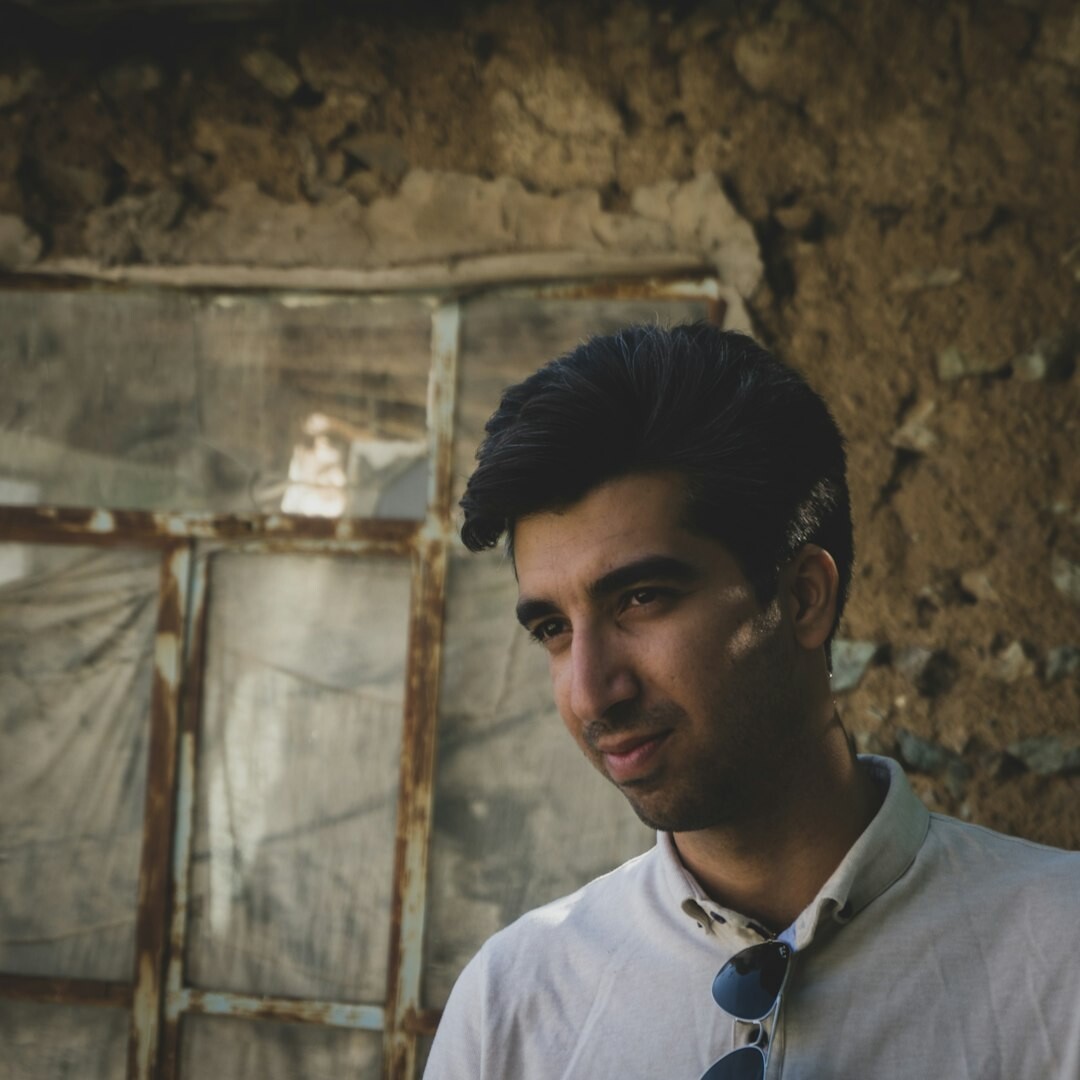 Professional Turkish male journalist with confident expression